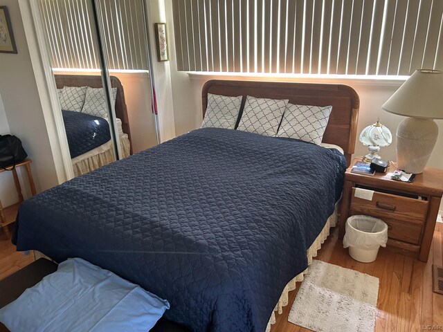 112 Kilkenny Dr, Onsted, MI 49265 - bedroom featuring wood finished floors