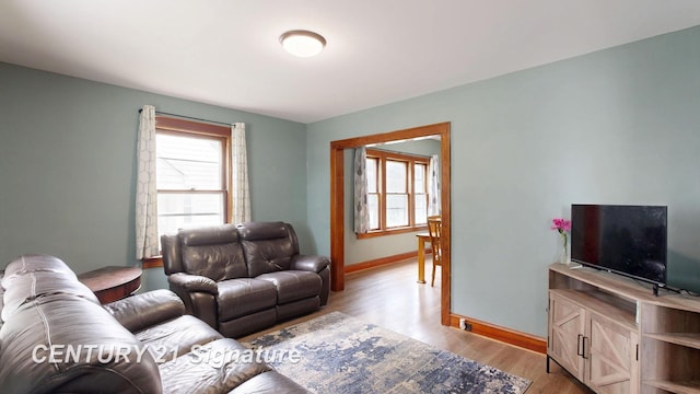 408 S Alp St, Bay City, MI 48706 - living room with baseboards and light wood-style flooring