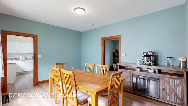 408 S Alp St, Bay City, MI 48706 - dining area with light wood finished floors