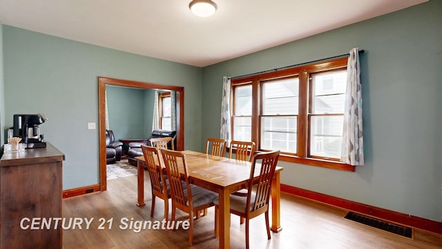 408 S Alp St, Bay City, MI 48706 - dining room with wood finished floors and baseboards