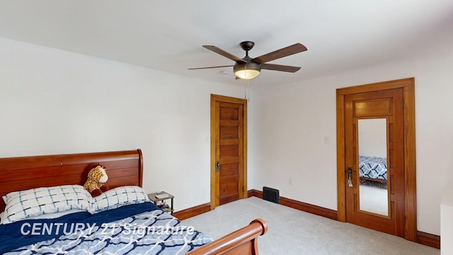 408 S Alp St, Bay City, MI 48706 - bedroom with carpet and a ceiling fan