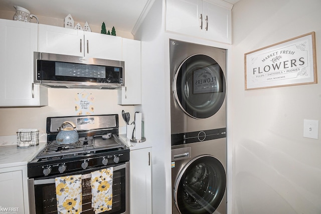 103 Lenawee St, Durand, MI 48429 - washroom featuring estacked washer and dryer