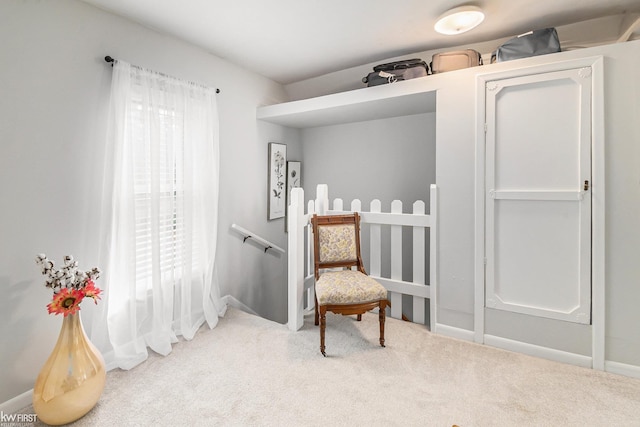 103 Lenawee St, Durand, MI 48429 - living area with carpet floors and baseboards