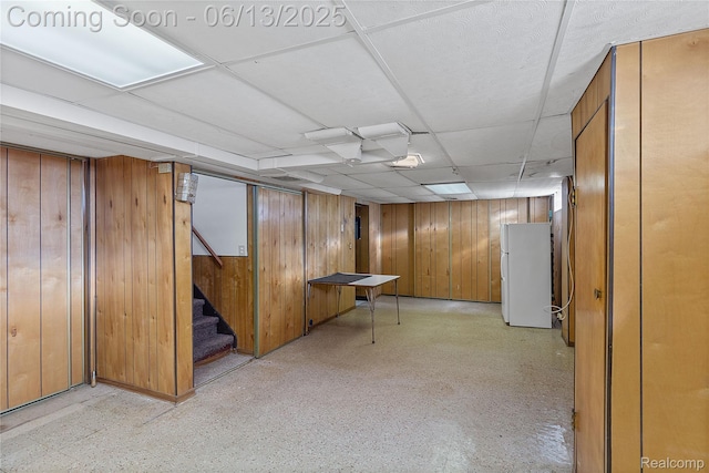 24921 Notre Dame St, Dearborn, MI 48124 - finished below grade area with freestanding refrigerator, wooden walls, and stairs