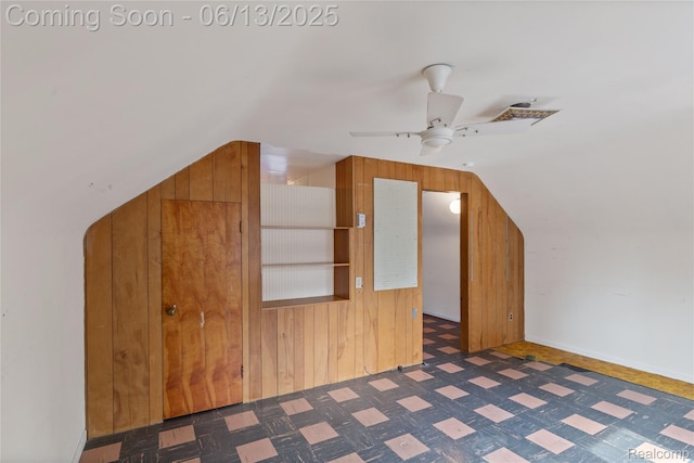 24921 Notre Dame St, Dearborn, MI 48124 - additional living space with lofted ceiling, wood walls, a ceiling fan, and tile patterned floors
