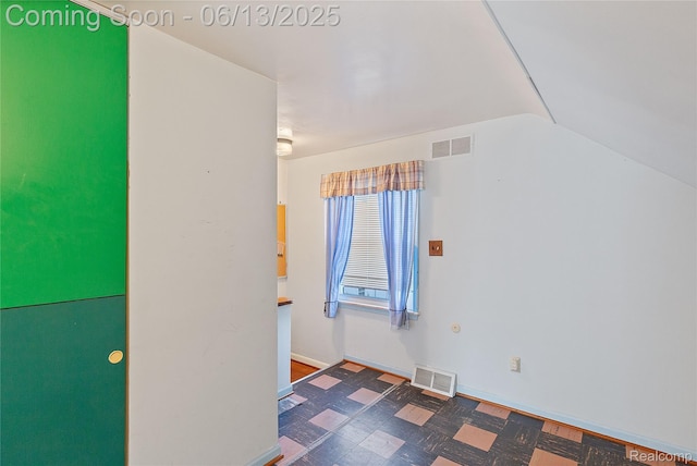 24921 Notre Dame St, Dearborn, MI 48124 - unfurnished room with lofted ceiling