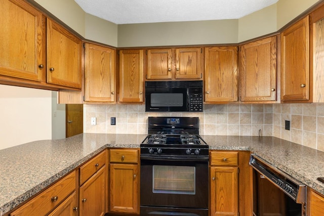5157 Cliff Ct Unit 54, Hudsonville, MI 49426 - kitchen with black appliances and brown cabinetry
