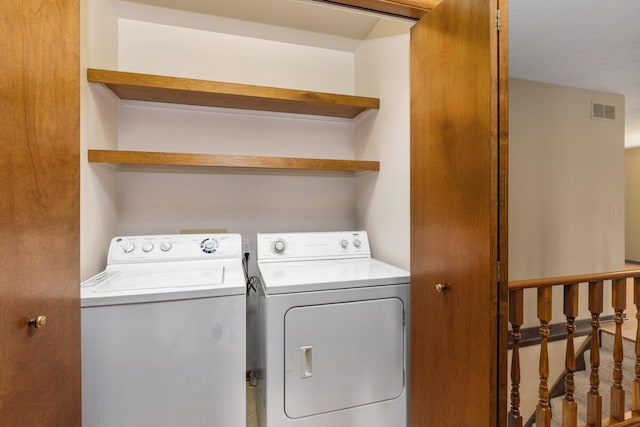 5157 Cliff Ct Unit 54, Hudsonville, MI 49426 - laundry area with washing machine and dryer