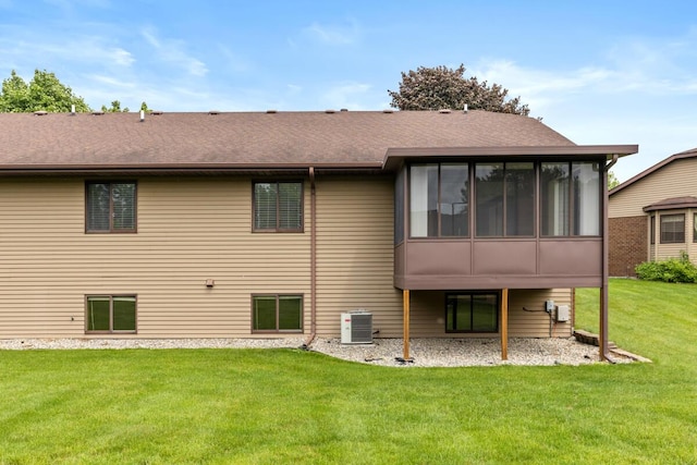 5157 Cliff Ct Unit 54, Hudsonville, MI 49426 - back of property featuring cooling unit, a sunroom, and a yard