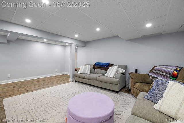 46341 Jasmine Ct, Chesterfield, MI 48047 - living room featuring wood finished floors, recessed lighting, and a drop ceiling