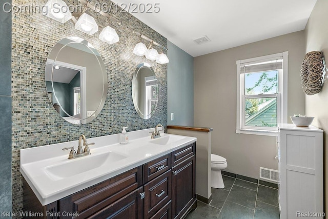 46341 Jasmine Ct, Chesterfield, MI 48047 - bathroom with tile walls, double vanity, and tile patterned flooring