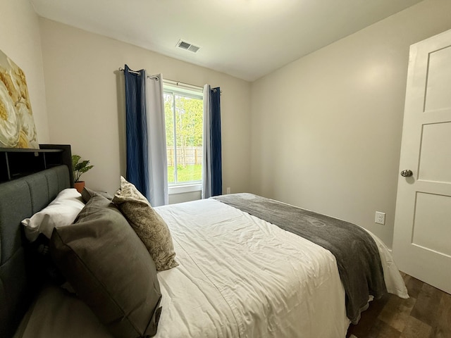 4223 S Harvard Ave, Baldwin, MI 49304 - bedroom with dark wood-style flooring