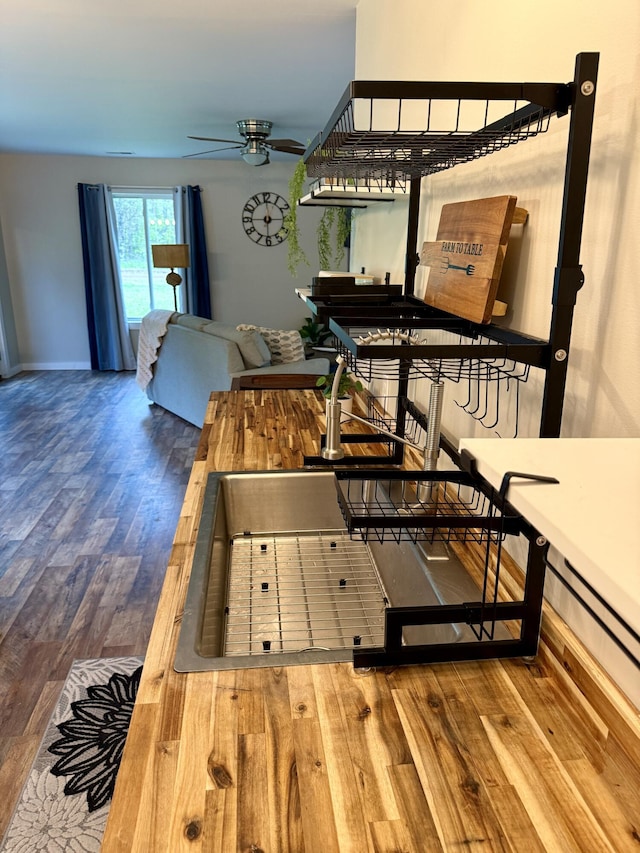 4223 S Harvard Ave, Baldwin, MI 49304 - interior space with wood finished floors, a ceiling fan, and baseboards