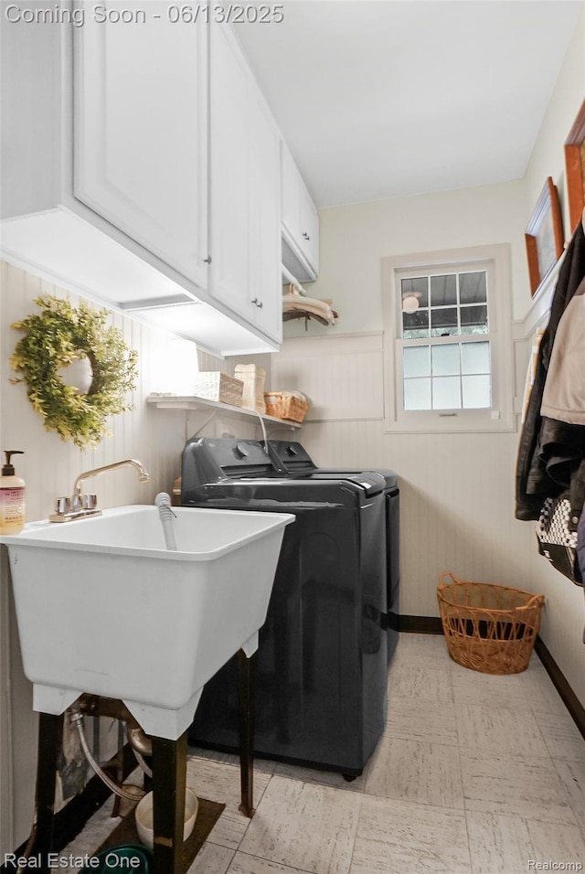 23229 Gilbar St, Novi, MI 48375 - washroom featuring washing machine and clothes dryer, cabinet space, light floors, and wainscoting