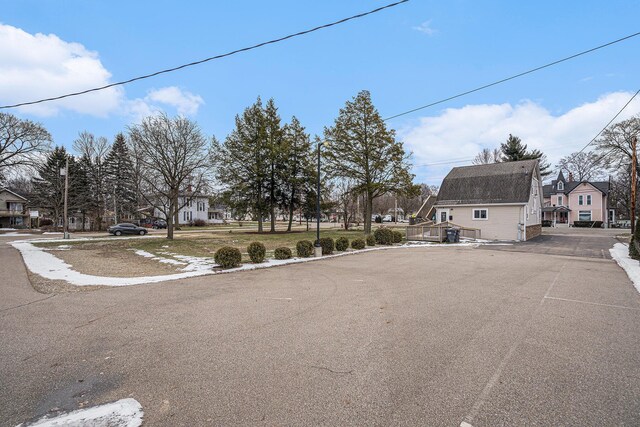 119 E Eliza St, Schoolcraft, MI 49087 - view of asphalt street featuring a residential view and street lighting