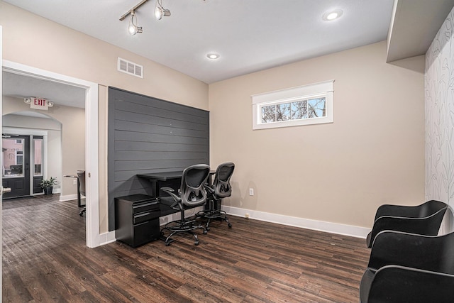 119 E Eliza St, Schoolcraft, MI 49087 - home office with dark wood-type flooring, baseboards, recessed lighting, and arched walkways