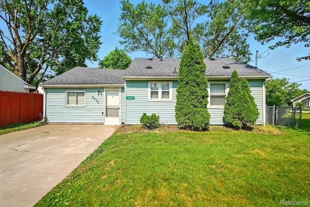 2070 Harwine St, Flint, MI 48532 - view of front of property with driveway and roof with shingles