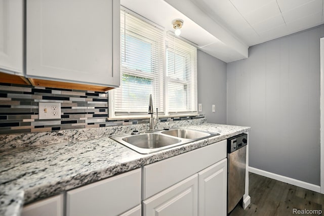 2070 Harwine St, Flint, MI 48532 - kitchen featuring dishwasher, dark wood-type flooring, and white cabinetry