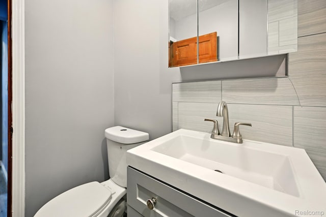 2070 Harwine St, Flint, MI 48532 - bathroom with vanity and toilet