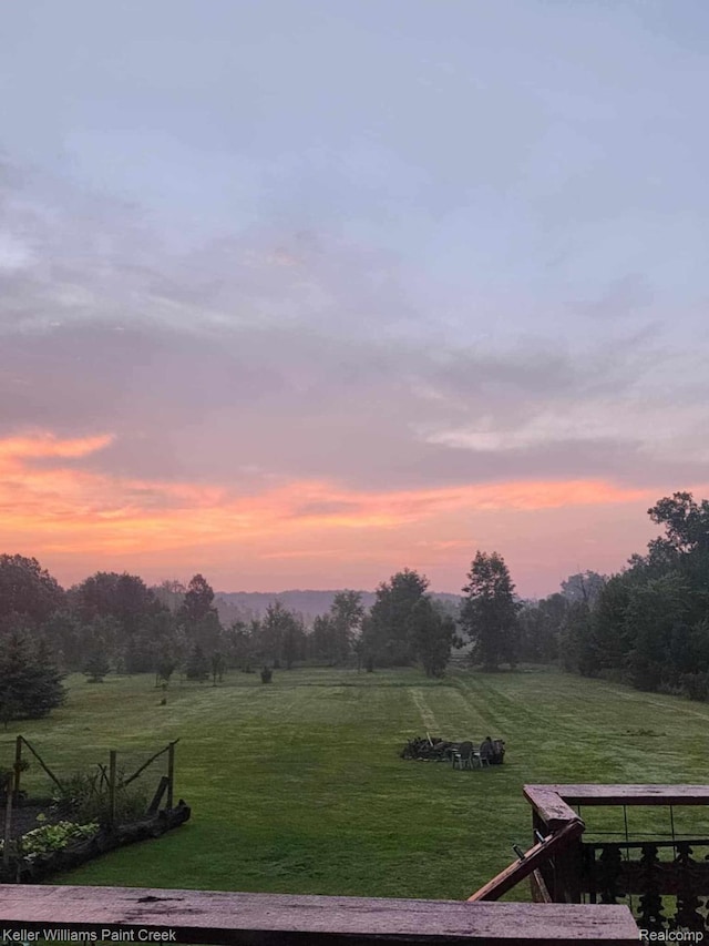 370 Wales Ridge Rd, Wales, MI 48027 - yard at dusk with a lawn and a rural view