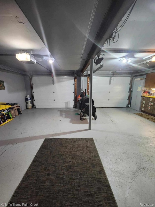 370 Wales Ridge Rd, Wales, MI 48027 - garage with a garage door opener