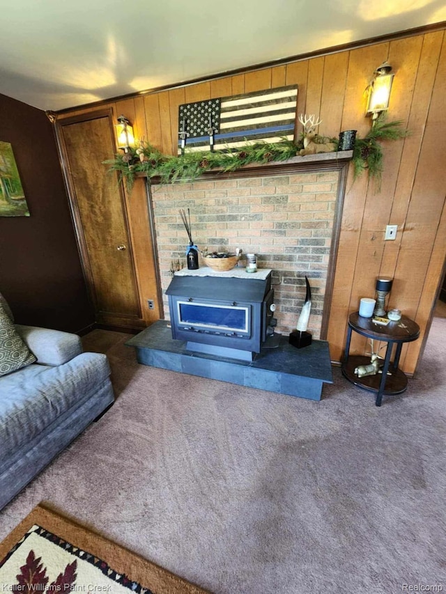 370 Wales Ridge Rd, Wales, MI 48027 - living room with a wood stove, carpet, and wood walls