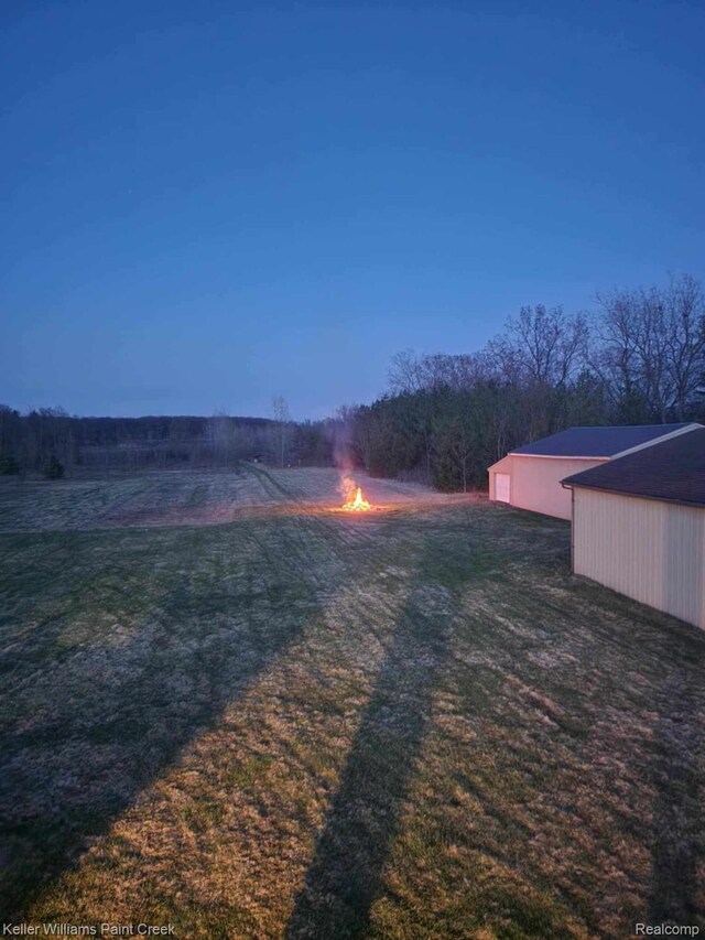 370 Wales Ridge Rd, Goodells, MI 48027 - view of green lawn featuring an outdoor structure and a pole building