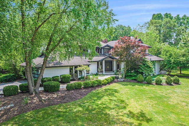 2002 Valleyview Dr, Ann Arbor, MI 48105 - view of front facade featuring a front yard and stucco siding