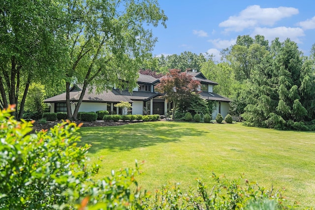 2002 Valleyview Dr, Ann Arbor, MI 48105 - rear view of property featuring a yard
