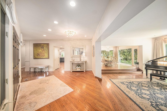 2002 Valleyview Dr, Ann Arbor, MI 48105 - entrance foyer featuring recessed lighting, baseboards, wood finished floors, and a chandelier