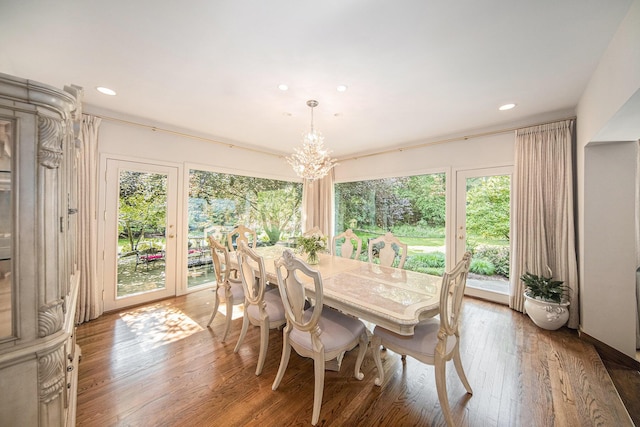 2002 Valleyview Dr, Ann Arbor, MI 48105 - dining area featuring a chandelier, healthy amount of natural light, recessed lighting, and wood finished floors