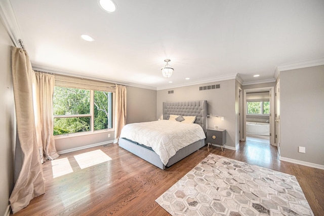 2002 Valleyview Dr, Ann Arbor, MI 48105 - bedroom with wood finished floors, recessed lighting, and crown molding