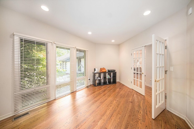 2002 Valleyview Dr, Ann Arbor, MI 48105 - spare room featuring french doors, light wood-style floors, and recessed lighting