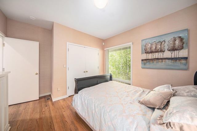 2002 Valleyview Dr, Ann Arbor, MI 48105 - bedroom with wood finished floors, baseboards, and a closet