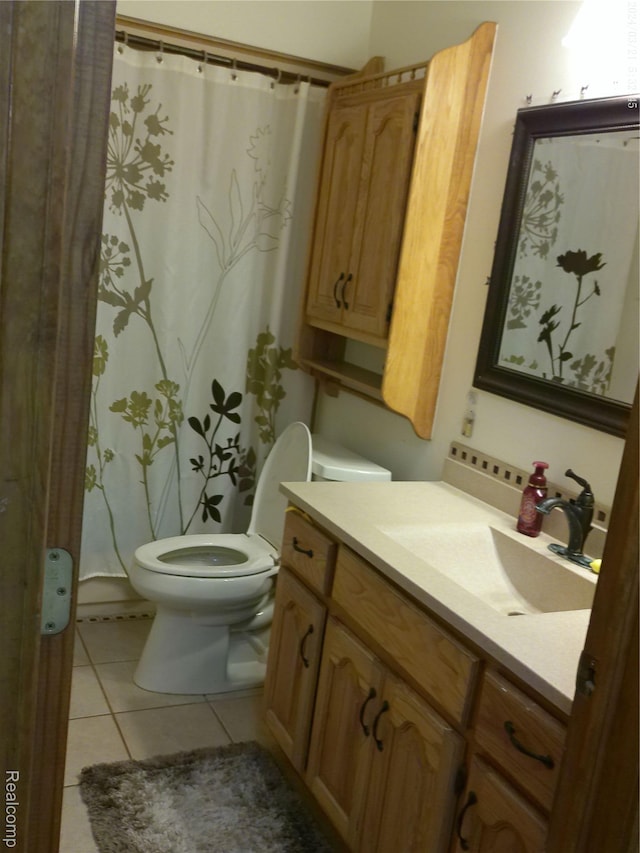 6140 Mcguire Rd, Fenton, MI 48430 - full bathroom with vanity, tile patterned floors, and a shower with shower curtain