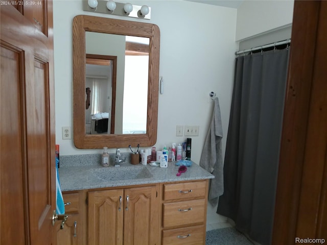6140 Mcguire Rd, Fenton, MI 48430 - bathroom featuring vanity and a shower with curtain