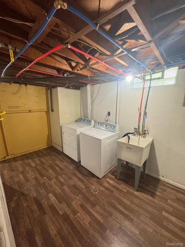 21451 N Nunneley Rd, Shelby Twp, MI 48036 - laundry area featuring washer and dryer and wood finished floors