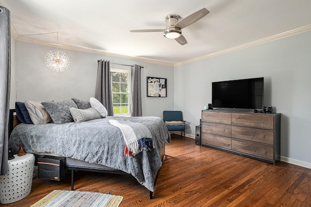 3225 Bronson Blvd, Kalamazoo, MI 49008 - bedroom with ornamental molding, dark wood finished floors, baseboards, a chandelier, and a ceiling fan