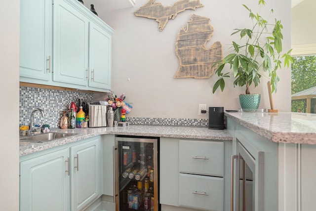 3225 Bronson Blvd, Kalamazoo, MI 49008 - indoor wet bar with wine cooler and decorative backsplash
