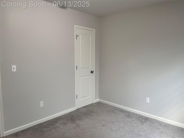 9145 Magnolia Ct, Davison, MI 48423 - spare room with dark carpet and baseboards