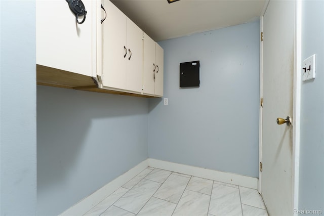 3260 Van Campen Dr, Waterford, MI 48329 - laundry area with light marble finish flooring and baseboards