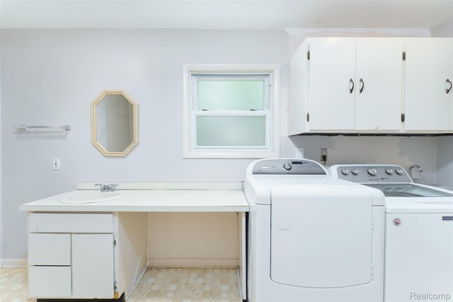 3260 Van Campen Dr, Waterford, MI 48329 - laundry area with cabinet space, washing machine and dryer, and baseboards