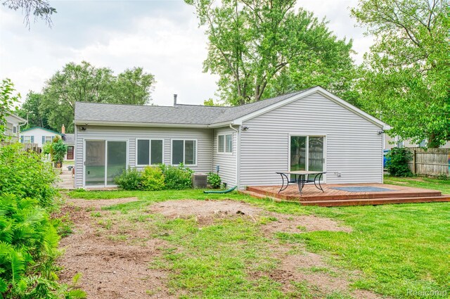 3260 Van Campen Dr, Waterford, MI 48329 - rear view of property featuring a wooden deck, cooling unit, and roof with shingles
