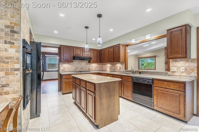 2456 Red Maple Dr, Troy, MI 48098 - kitchen with black appliances, under cabinet range hood, decorative backsplash, light countertops, and a kitchen island
