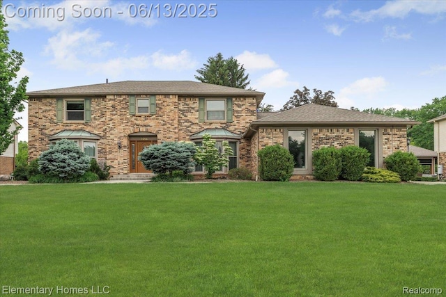 2456 Red Maple Dr, Troy, MI 48098 - view of front of property featuring a front yard and brick siding
