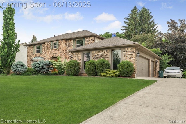 2456 Red Maple Dr, Troy, MI 48098 - view of front facade with a front yard, driveway, brick siding, and a garage
