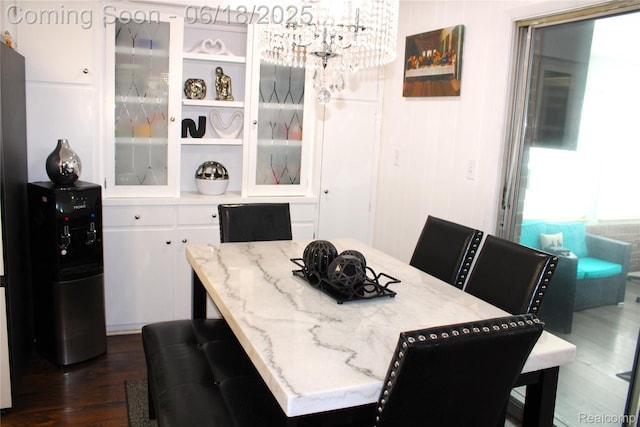 5095 Camborne Ct, Flint, MI 48504 - dining area with dark wood-style floors and a chandelier