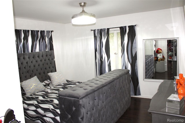 5095 Camborne Ct, Flint, MI 48504 - bedroom with wood finished floors and baseboards