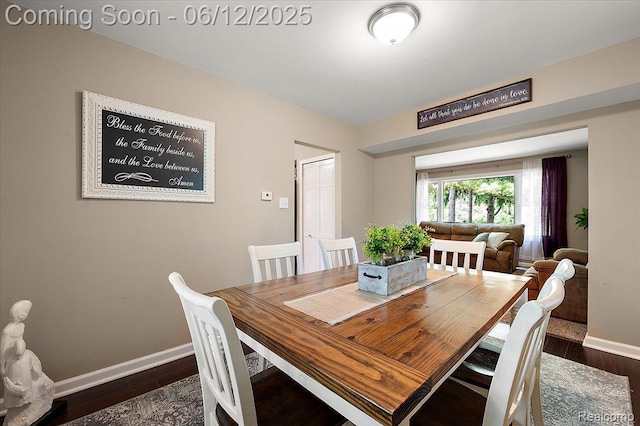 5836 Ewalt Rd, Imlay City, MI 48444 - dining area with dark wood-style flooring