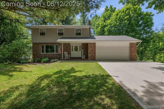 5836 Ewalt Rd, Imlay City, MI 48444 - traditional-style house with a garage, driveway, brick siding, and a front yard